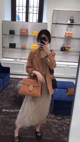 Delvaux Brillant MM Surpiqué 그레인 송아지 가죽 아이보리